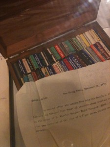 A glass case outside the theater, containing historical documents and matchbooks relevant to the goings-on in the play. Photo by Christopher Arnott.
