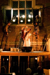 Barret O'Brien (center, in red) as Dionysus bathing Pentheus in wine and honey in Michael Donahue's 2007 Yale Summer Cabaret production of Euripides' The Bacchae. Photo by Sarah Scranton.