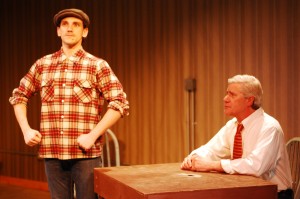 George Kulp, seated, as Harry Fatt in Waiting for Lefty, with the upstanding Christian Shaboo as Phillips.