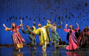 Richard Ruiz, in yellow, leading the dance in The Winter's Tale at Yale Rep through April 7. Photo by Joan Marcus.