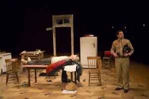 Kevin Tighe (on table) with Ben Becher in Curse of the Starving Class at Long Wharf Theatre. Photo by T. Charles Erickson.