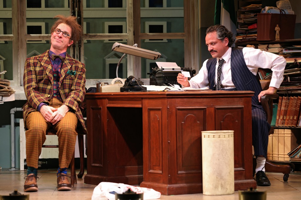 Steven Epp as the Maniac and Jesse J. Perez as Bertozzi in Christopher Bayes' production of Dario Fo's Accidental Death of an Anarchist at Yale Rep through Dec. 21. Photo by Joan Marcus.