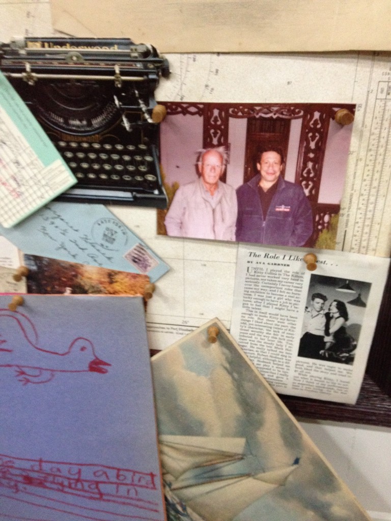 Pinned to this bulletin board is a photo of The Shadow of the Hummingbird's director Gordon Edelstein and its set designer Eugene Lee.